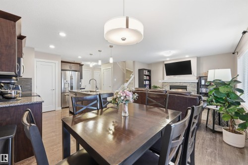 140 Axbridge Gate, Sherwood Park, AB - Indoor Photo Showing Other Room With Fireplace