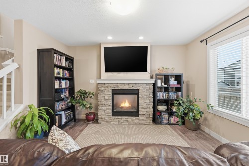 140 Axbridge Gate, Sherwood Park, AB - Indoor Photo Showing Living Room With Fireplace