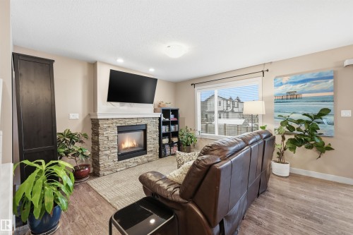 140 Axbridge Gate, Sherwood Park, AB - Indoor Photo Showing Living Room With Fireplace