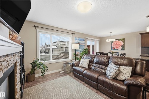 140 Axbridge Gate, Sherwood Park, AB - Indoor Photo Showing Living Room With Fireplace