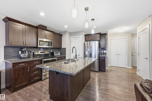 140 Axbridge Gate, Sherwood Park, AB - Indoor Photo Showing Kitchen With Stainless Steel Kitchen With Double Sink With Upgraded Kitchen