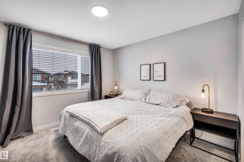 98 Kingsbury Circle, Spruce Grove, AB - Indoor Photo Showing Bedroom