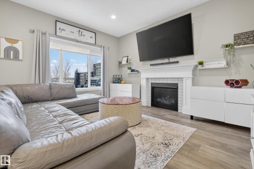 1222 164A Street, Edmonton, AB - Indoor Photo Showing Living Room With Fireplace