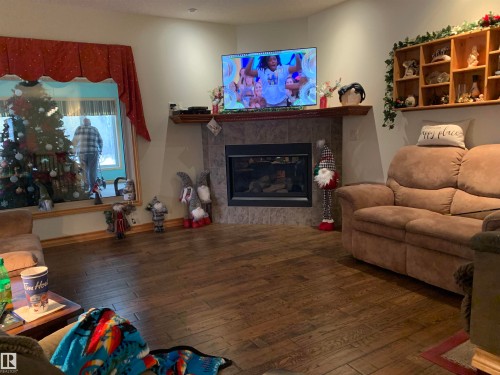 57 Longview Drive, Spruce Grove, AB - Indoor Photo Showing Living Room With Fireplace