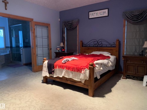 57 Longview Drive, Spruce Grove, AB - Indoor Photo Showing Bedroom