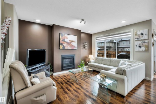 5512 Allbright Square, Edmonton, AB - Indoor Photo Showing Living Room With Fireplace