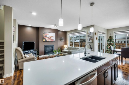 5512 Allbright Square, Edmonton, AB - Indoor Photo Showing Kitchen With Fireplace With Double Sink