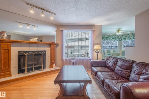 31 Harwood Drive, St. Albert, AB - Indoor Photo Showing Living Room With Fireplace