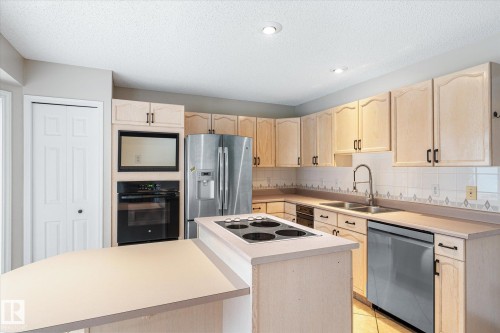 4 90 Liberton Drive, St. Albert, AB - Indoor Photo Showing Kitchen With Double Sink