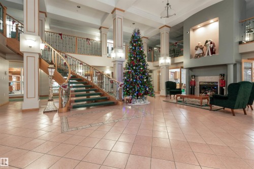 134 200 Bethel Drive, Sherwood Park, AB - Indoor Photo Showing Other Room With Fireplace