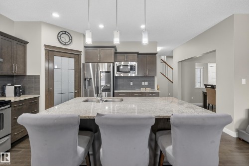 7816 18 Avenue, Edmonton, AB - Indoor Photo Showing Kitchen With Stainless Steel Kitchen With Double Sink With Upgraded Kitchen