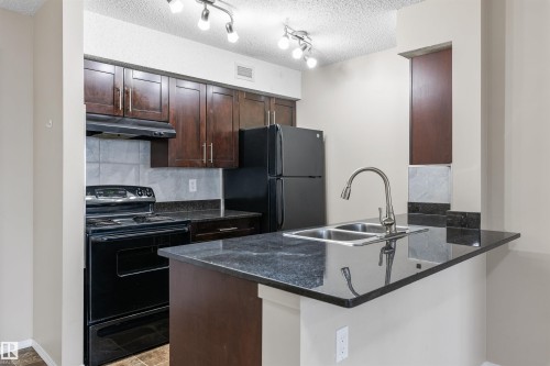 312 1060 Mcconachie Boulevard, Edmonton, AB - Indoor Photo Showing Kitchen With Double Sink
