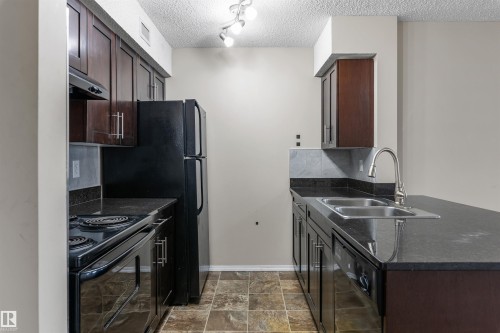 312 1060 Mcconachie Boulevard, Edmonton, AB - Indoor Photo Showing Kitchen With Double Sink