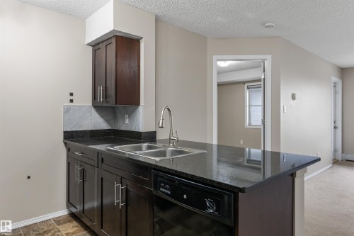 312 1060 Mcconachie Boulevard, Edmonton, AB - Indoor Photo Showing Kitchen With Double Sink