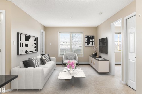 312 1060 Mcconachie Boulevard, Edmonton, AB - Indoor Photo Showing Living Room