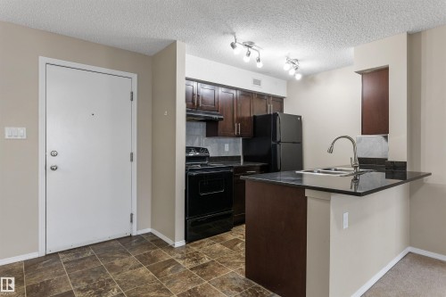 312 1060 Mcconachie Boulevard, Edmonton, AB - Indoor Photo Showing Kitchen With Double Sink
