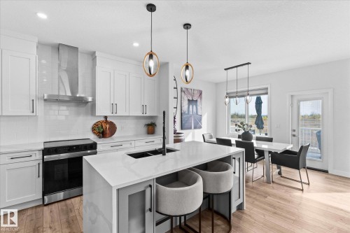 153 Westbrook Wynd, Fort Saskatchewan, AB - Indoor Photo Showing Kitchen With Upgraded Kitchen