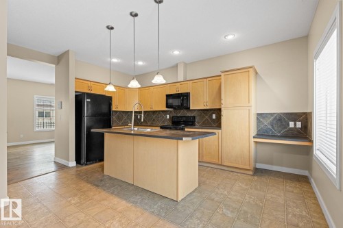 39 13825 155 Avenue, Edmonton, AB - Indoor Photo Showing Kitchen With Double Sink