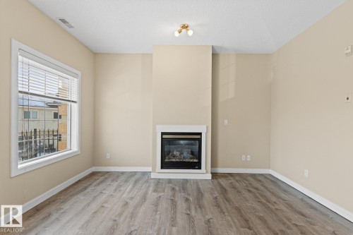 39 13825 155 Avenue, Edmonton, AB - Indoor Photo Showing Living Room With Fireplace