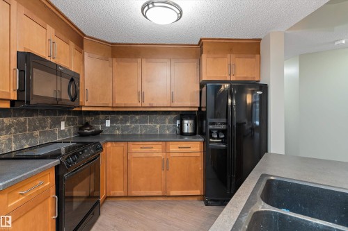 402 9020 Jasper Avenue, Edmonton, AB - Indoor Photo Showing Kitchen