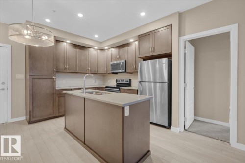 227 1008 Rosenthal Boulevard, Edmonton, AB - Indoor Photo Showing Kitchen