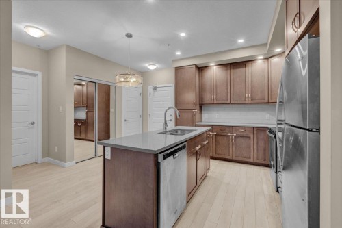 227 1008 Rosenthal Boulevard, Edmonton, AB - Indoor Photo Showing Kitchen