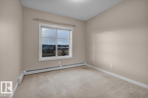 227 1008 Rosenthal Boulevard, Edmonton, AB - Indoor Photo Showing Other Room