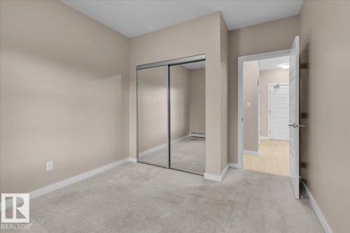 227 1008 Rosenthal Boulevard, Edmonton, AB - Indoor Photo Showing Other Room