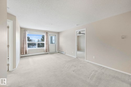 216 13625 34 Street, Edmonton, AB - Indoor Photo Showing Other Room