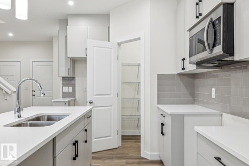 309 26 Street, Edmonton, AB - Indoor Photo Showing Kitchen With Double Sink