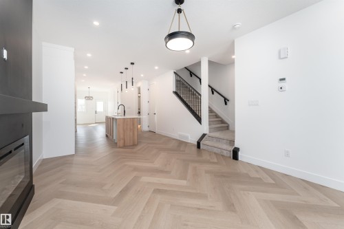 3127 Magpie Way, Edmonton, AB - Indoor Photo Showing Other Room With Fireplace