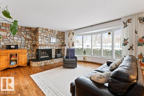 13 Glenwood Crescent, St. Albert, AB - Indoor Photo Showing Living Room With Fireplace