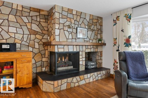 13 Glenwood Crescent, St. Albert, AB - Indoor Photo Showing Other Room With Fireplace