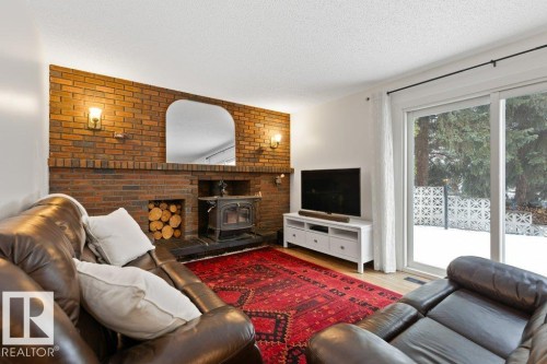 13 Glenwood Crescent, St. Albert, AB - Indoor Photo Showing Living Room With Fireplace