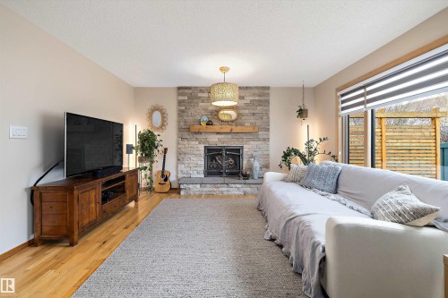 1060 Wedgewood Boulevard, Edmonton, AB - Indoor Photo Showing Living Room With Fireplace