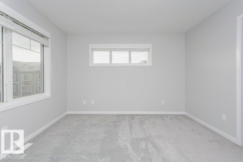 101 320 Secord Boulevard, Edmonton, AB - Indoor Photo Showing Other Room