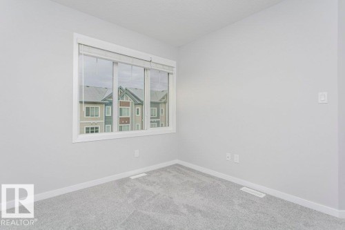 101 320 Secord Boulevard, Edmonton, AB - Indoor Photo Showing Other Room