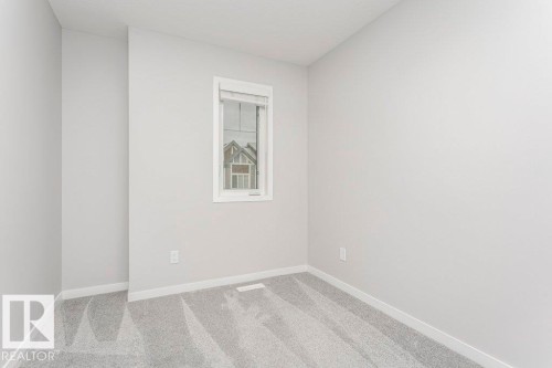 101 320 Secord Boulevard, Edmonton, AB - Indoor Photo Showing Other Room