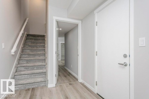 101 320 Secord Boulevard, Edmonton, AB - Indoor Photo Showing Other Room