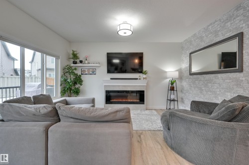 7234 Chivers Place, Edmonton, AB - Indoor Photo Showing Living Room With Fireplace