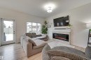 7234 Chivers Place, Edmonton, AB  - Indoor Photo Showing Living Room With Fireplace 