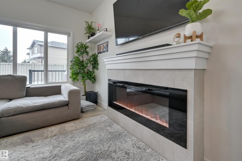 7234 Chivers Place, Edmonton, AB - Indoor Photo Showing Living Room With Fireplace