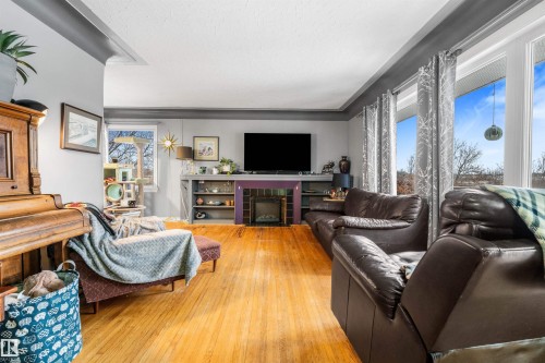 55229 Range Road 13, Rural Lac Ste. Anne County, AB - Indoor Photo Showing Living Room With Fireplace