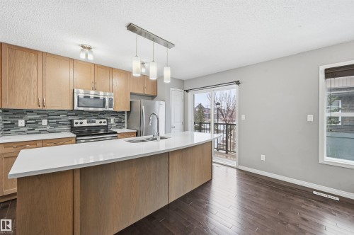 4033 Orchards Drive, Edmonton, AB - Indoor Photo Showing Kitchen With Stainless Steel Kitchen With Double Sink With Upgraded Kitchen