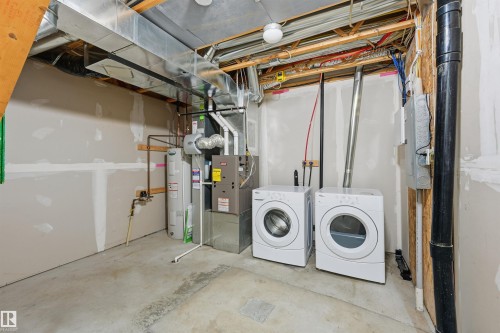 4033 Orchards Drive, Edmonton, AB - Indoor Photo Showing Laundry Room