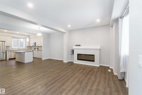 54 2072 Wonnacott Way, Edmonton, AB - Indoor With Fireplace