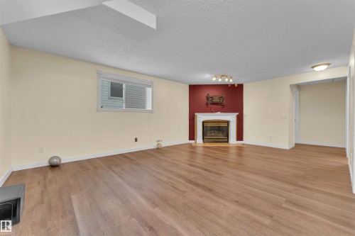 829 Blacklock Way, Edmonton, AB - Indoor Photo Showing Living Room With Fireplace