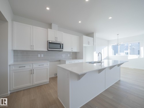 104 Nerine Crescent, St. Albert, AB - Indoor Photo Showing Kitchen With Upgraded Kitchen