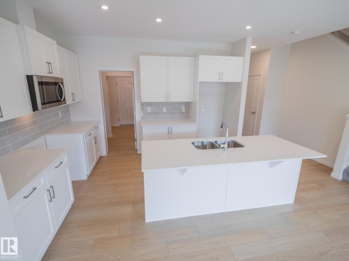 17728 7 Street, Edmonton, AB - Indoor Photo Showing Kitchen With Double Sink