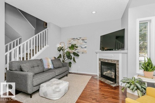 9109 98 Avenue, Edmonton, AB - Indoor Photo Showing Living Room With Fireplace